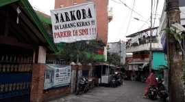 Peringatan bahaya narkoba  di Kampung Boncos, Kel. Kota Bambu Selatan, Kec. Palmerah, Jakarta Barat. (Kompas/RIMA WAHYUNINGRUM)