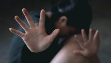 Stop violence and rape concept,concept photo of sexual assault,traumatized young girl