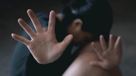 Stop violence and rape concept,concept photo of sexual assault,traumatized young girl